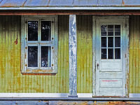 front porch of abandoned farmhouse