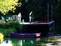 tow scow on river